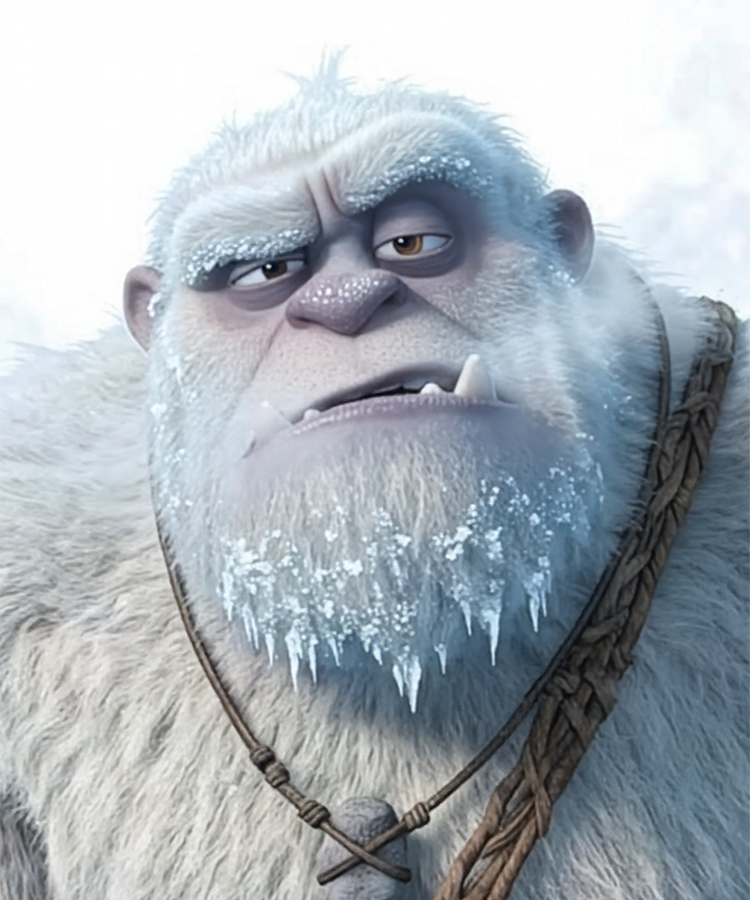 Close-up of a snow-covered creature with a braided leather strap around its neck.